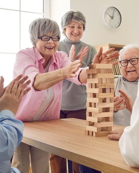 seniors playing janga | The Hampton at Meadows Place seniors playing janga