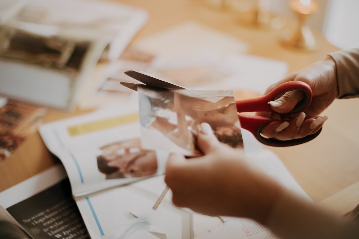 cutting an image creating a vision board