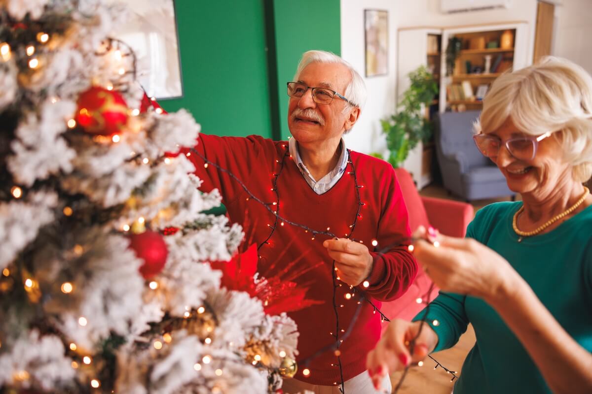 older adults decorating senior living apartments