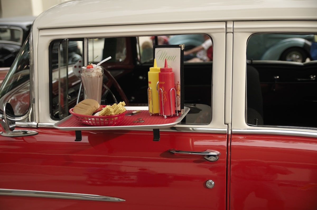 Retro car with fast food by the window | The Hampton at Meadows Place Retro car with fast food by the window