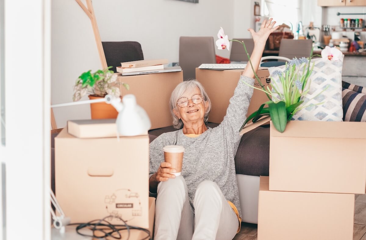moving happy woman | The Hampton at Meadows Place