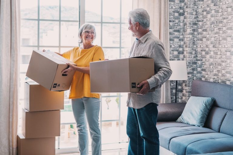 Couple of seniors moving into senior living