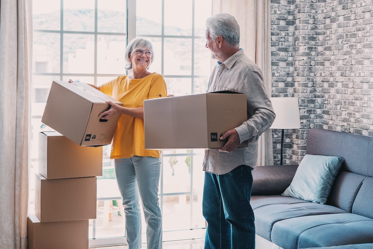 Couple of seniors moving into senior living